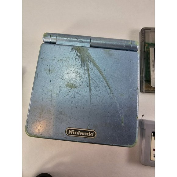 Nintendo Game Boy Advance SP Pearl Blue Bundle W/ 7 Games & Charger - Picture 6 of 10